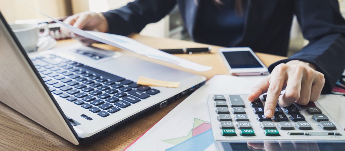 Businessman working on Desk office business financial accounting calculate